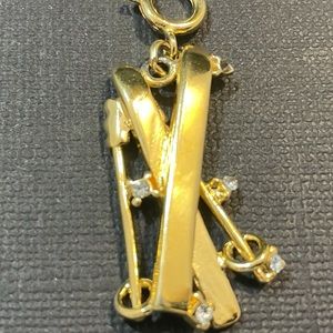 Vintage Gold Tone Pendant “Monet”. Used.